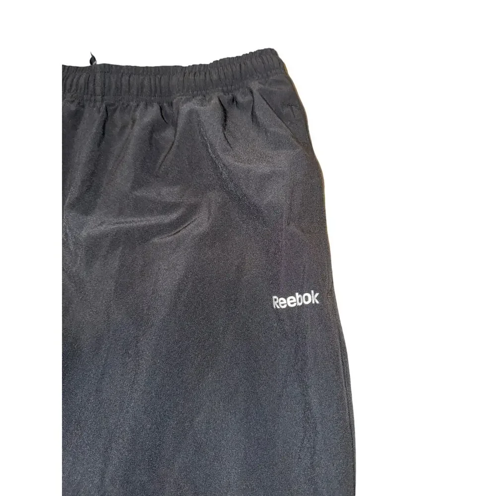 Vintage Reebok Y2K black wind pants men’s medium elastic waist retro athletic